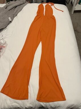 PrettyLittleThing Orange Halter Flared Jumpsuit